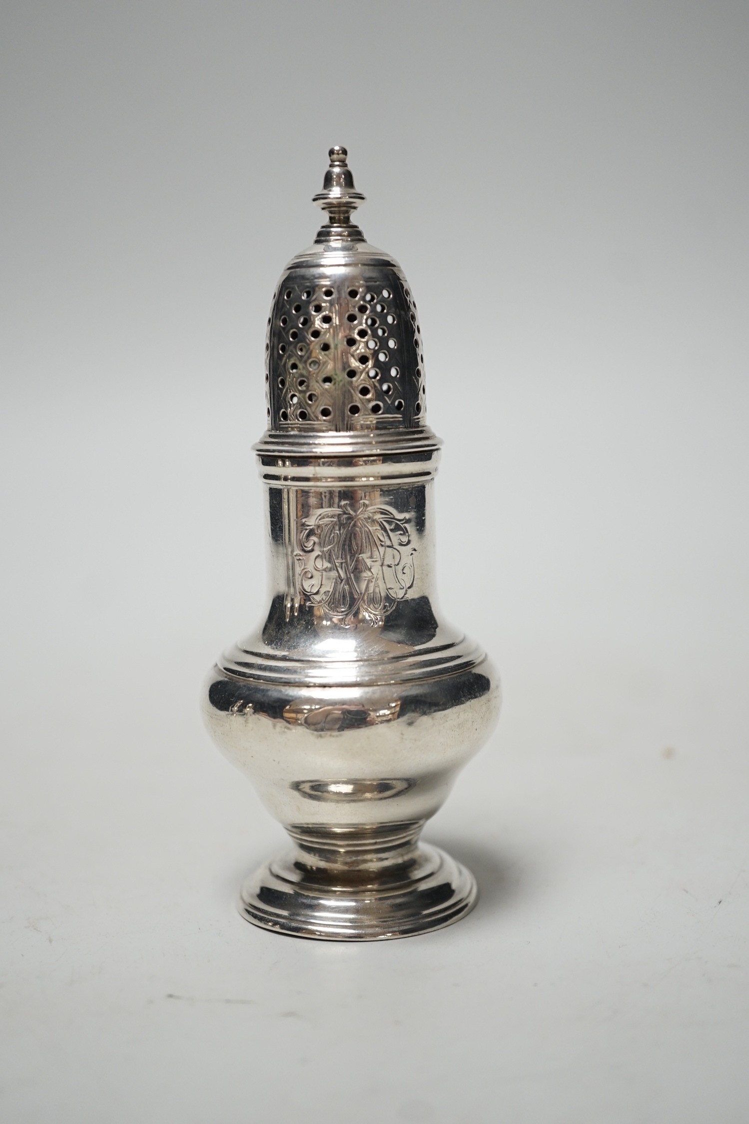 A George II silver baluster pepperette, Samuel Wood, London, 1751, 12.2cm, 90 grams.